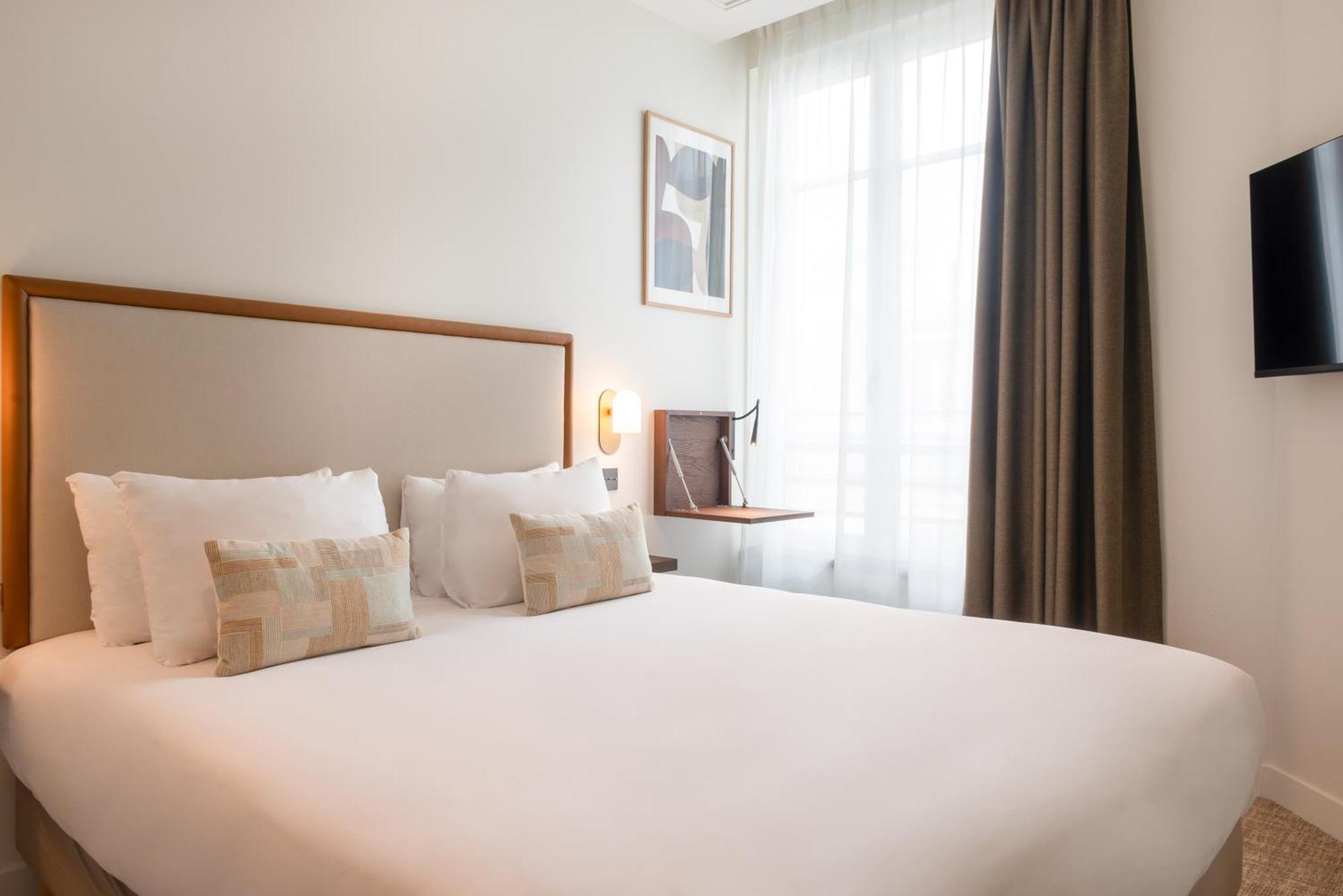 Le Lampika Hotel パリ 部屋 写真